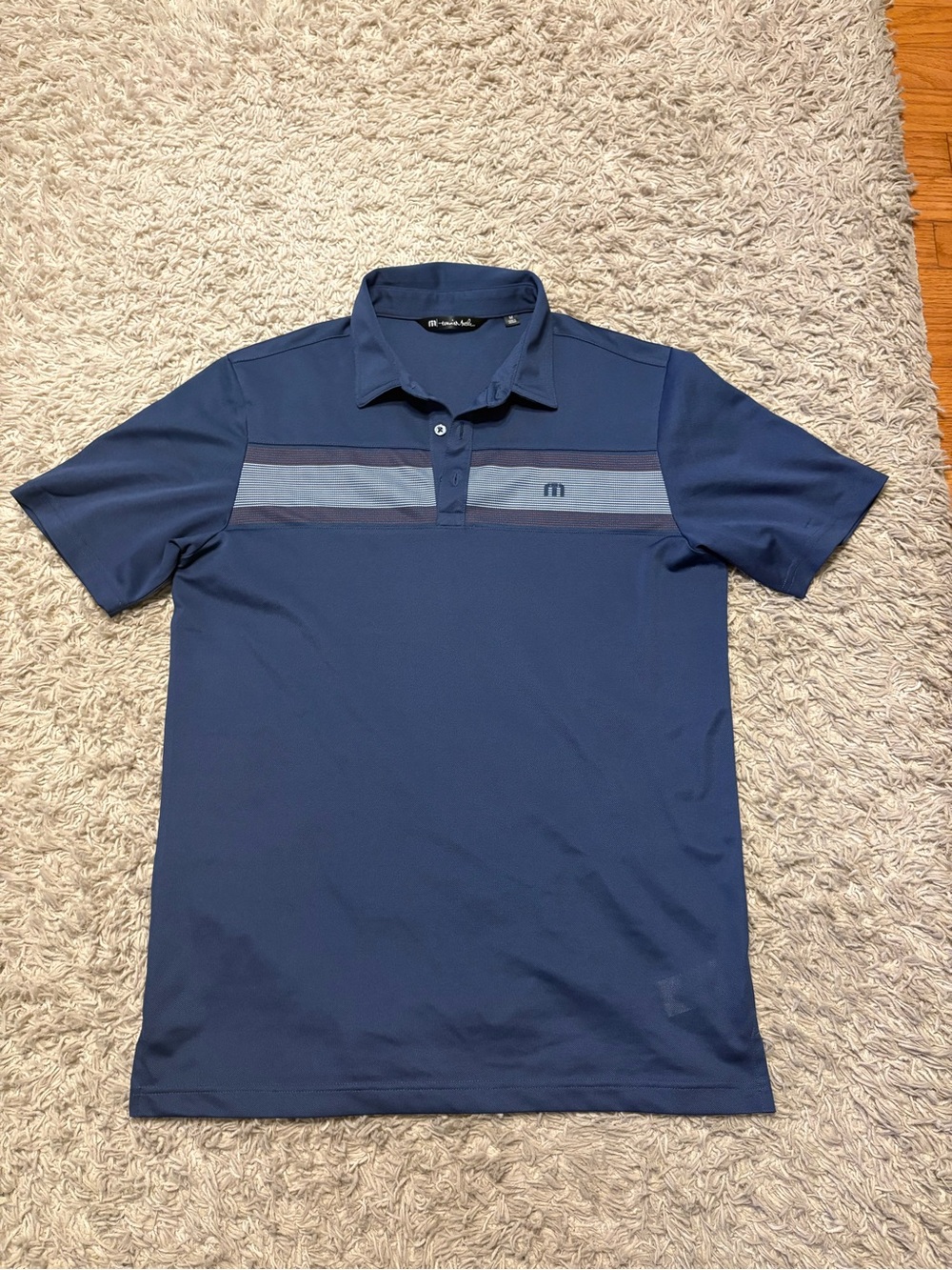 Travis Mathew Navy Polo with Light Blue Contrast Stripe